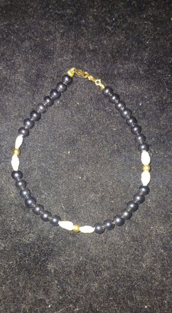 14k gold onyx & rice pearl bracelet