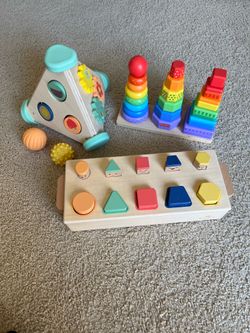 KiwiCo and Fisher Price Wooden Baby Developmental Toys