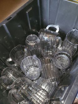 Lot of 11 clear plastic pitcher's  $20
