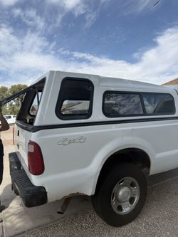 camper shell, truck cap, topper, or truck bed shell.