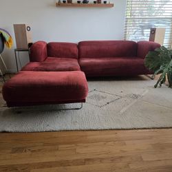 Designer Couch And Ottoman With Chrome 