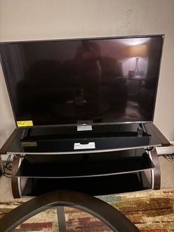 52 inch LG TV and stand