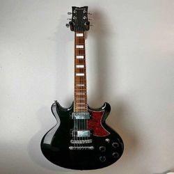 company short Electric Guitar - Shred Music with Superior Sound Power