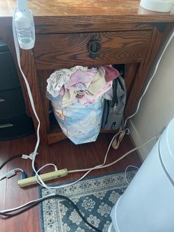 Small side table and babygirl clothes