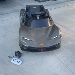 12V Kids Sports Car w/ Remote, Lights & Music 