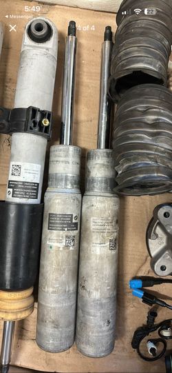 Rear M3 G8X x drive stock springs and structs shocks