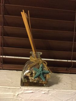 Perfume decorative bottle with scented sticks