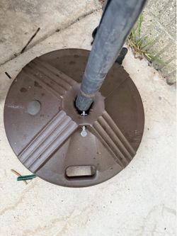 Umbrella plastic stand just add water or sand