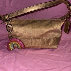 Coach gold purse F0868–42019