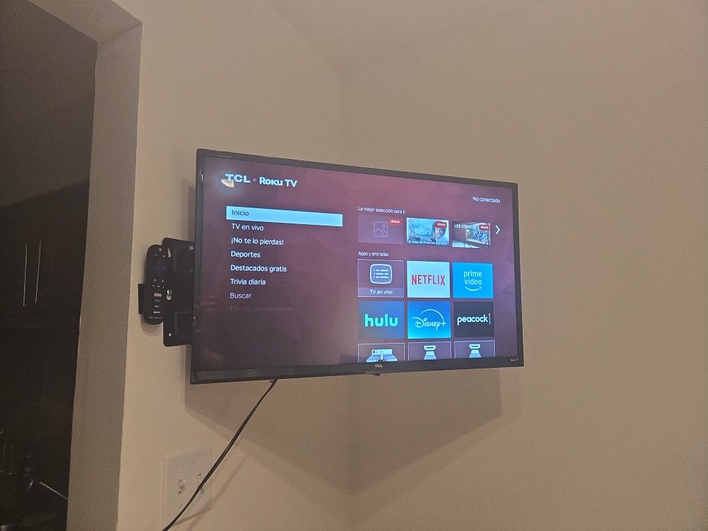 TCL Roku Tv with movable wall mount included