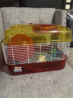 hamster cage with extra stuff