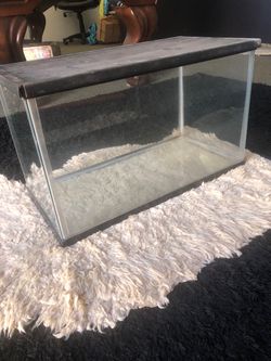 Small aquarium approx 16x10x8inches with top. $20 cash firm -must come to H.B