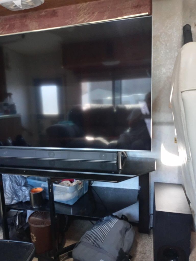 65 Inch Samsung TV And Sound Bar And Subwoofer And TV Stand