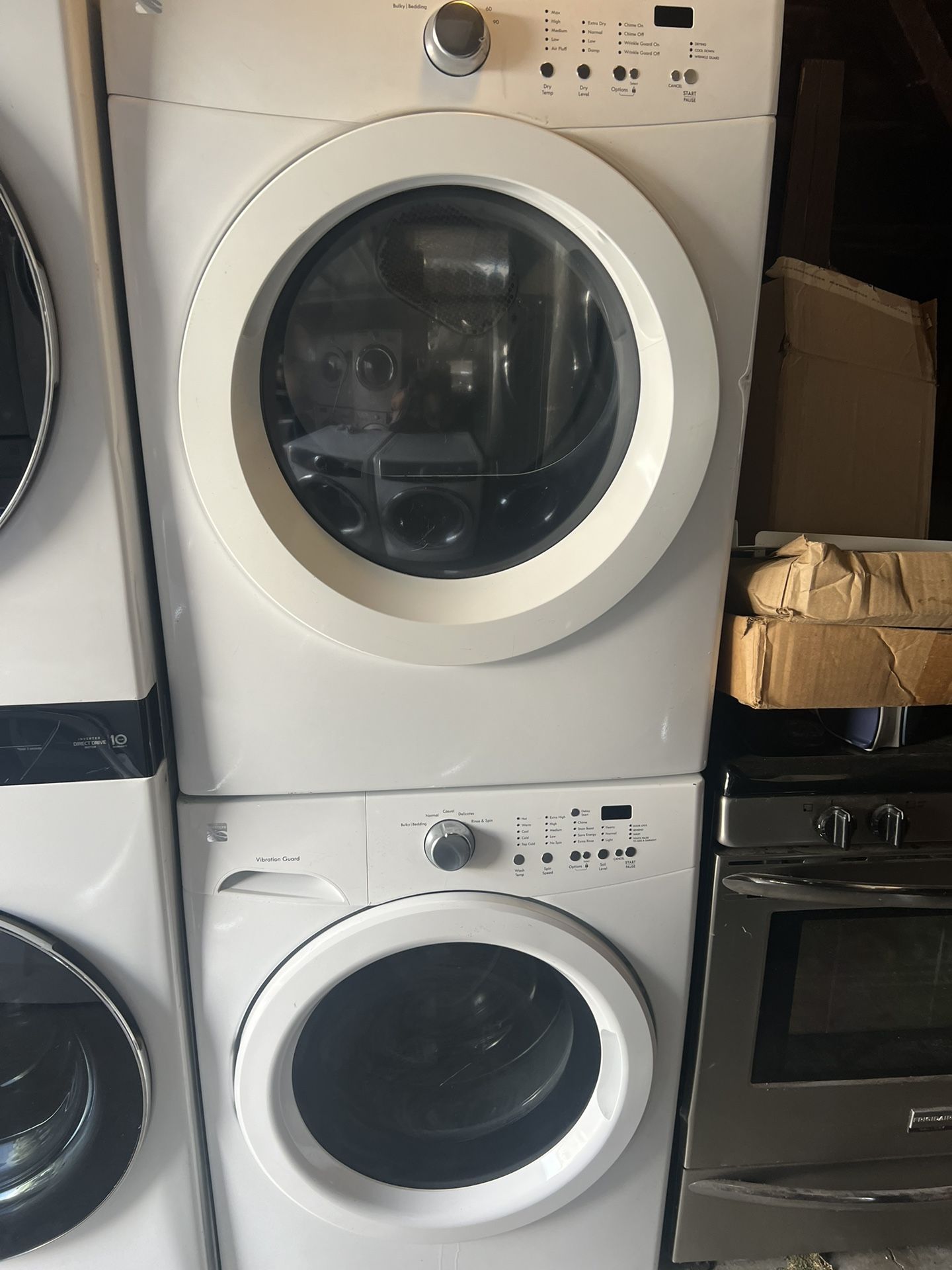 Kenmore 220 volt front load electric washer and dryer with three months warranty free delivery in the Oakland area outside the Oakland area there is a