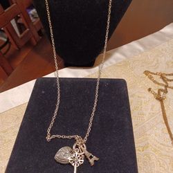 NEW BRIGHTON CHARM  NECKLACE WITH HEART, KEY, EIFFEL TOWER, WITH BRIGHTON BAG $60.. Reduced $30. Read Descripton