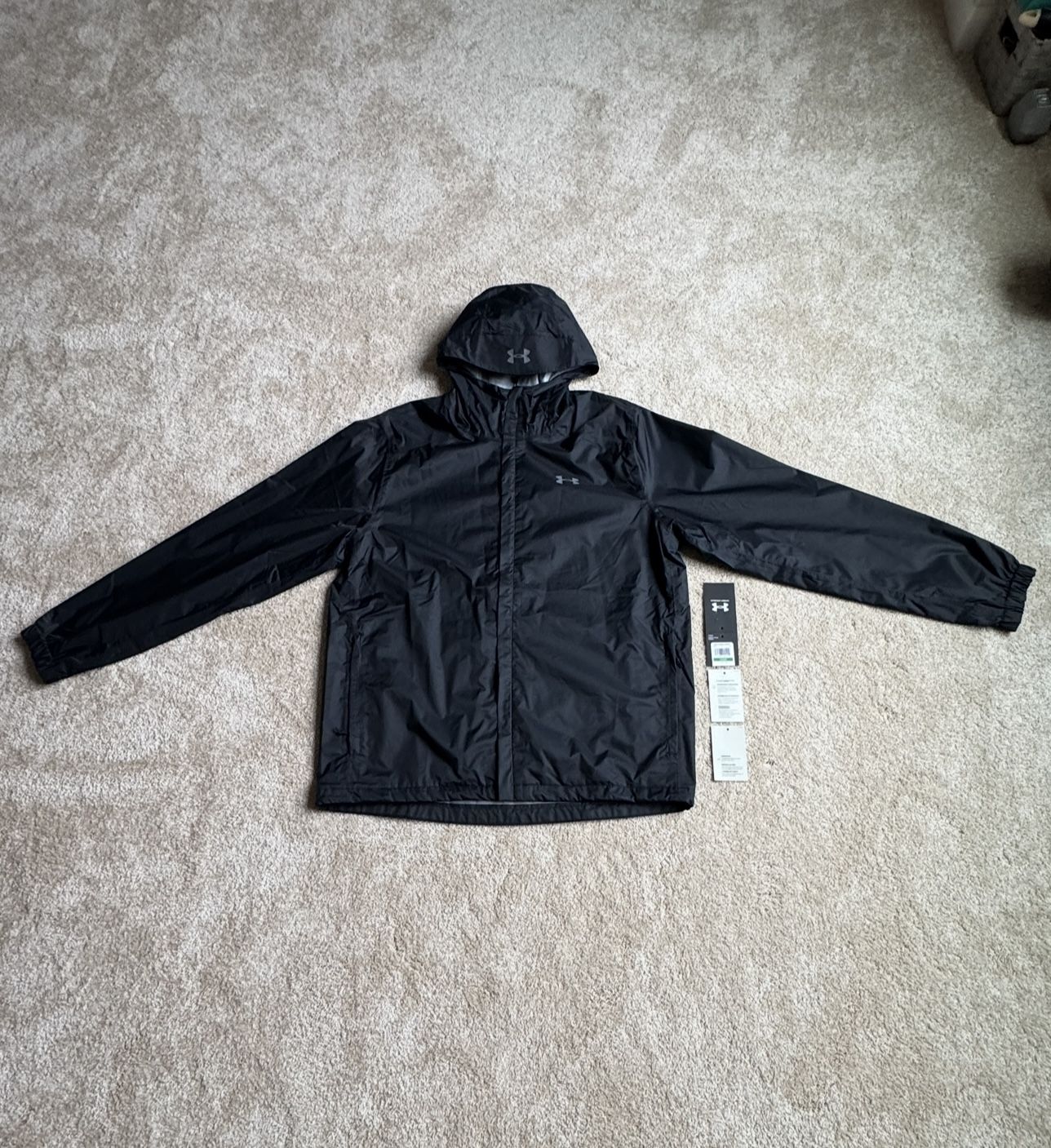 Under Armour UA Storm technology, brand new/never used w/tags, breathable, 2 layer outer fabric with fully taped seams, 100% WATERPROOF