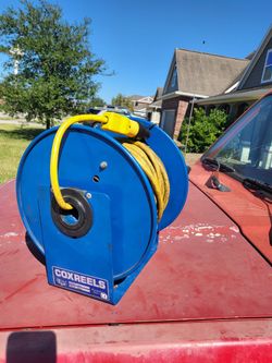 100 Ft Extension Cord On A Coxreels Brand Reel.
