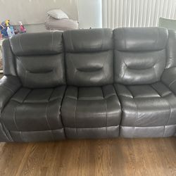 Ashley Leather Reclining sofa and recliner - Like Brand New & Always Covered  