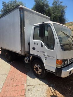 Isuzu NPR 98 14ft with liftgate.