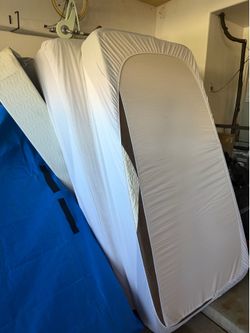 2 twin memory foam mattresses & box springs