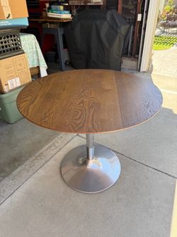 Hardwood chrome pedestal table