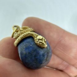 Gold dipped and Sterling Vermeil Snake motif pendant with a large beautiful natural lapis Egg gemstone.