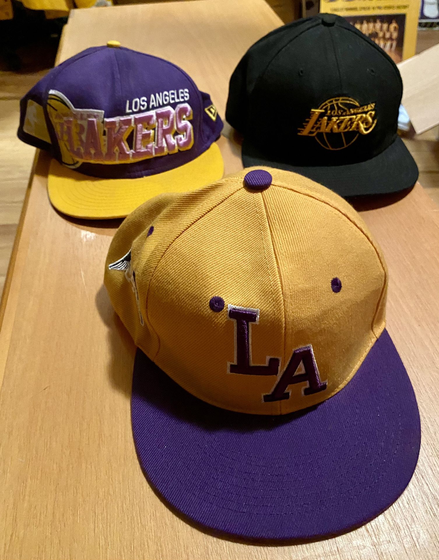 3 Lakers hats, MPLS socks and gloves