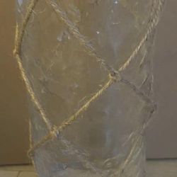 Glass vase with jute netting