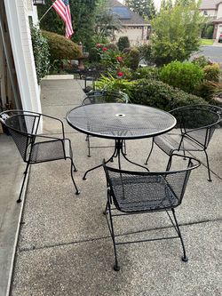 Wrought iron table and chairs