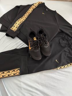 Black and Gold Nike Jogging Suit with matching Nike VaporMax