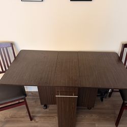 Dining table with 2 chairs.