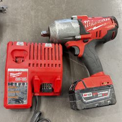 Milwaukee M18 Fuel 1/2” high torque wrench w batt 5.0 and chrg no trades pick up in Tacoma FIRM PRICE