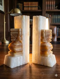 Vintage Mexican hand-carved onyx or quartz stone bookends.