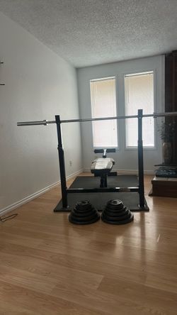 Olympic weight set with marcy bench