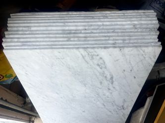 White Carrara marble tiles 18”x36”