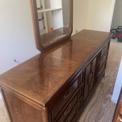 A bedroom suite . Headboard Q ,wardrobe with mirror ,wardrobe ,bedside table 60$