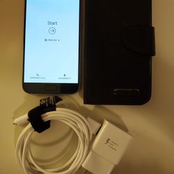 Samsung Galaxy S7 - 32GB - Black (Unlocked) - Includes Charger & Case