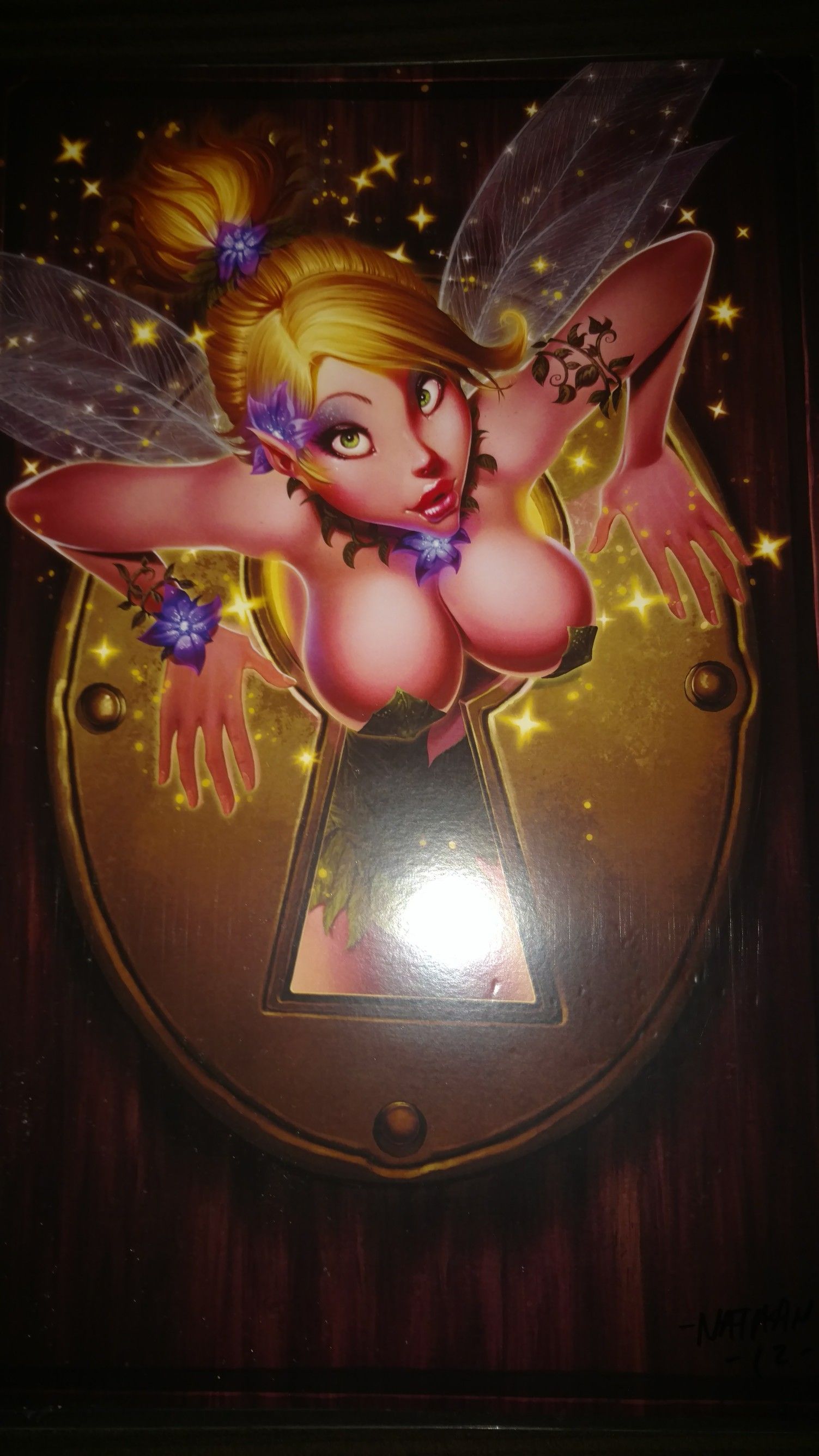 Great print of Tinkerbell going through a keyhole
