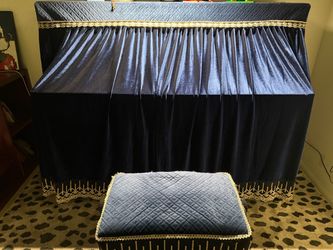 Piano cover and piano stool cover, $30, in new condition.