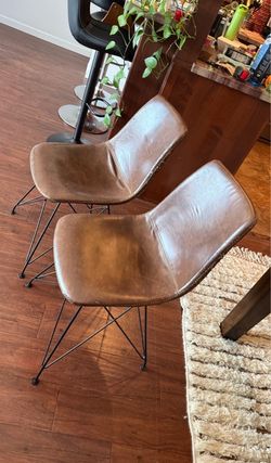 FREE – Two Modern Leather-Look Chairs