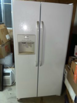 White Side-by-Side Refrigerator with Ice Dispenser