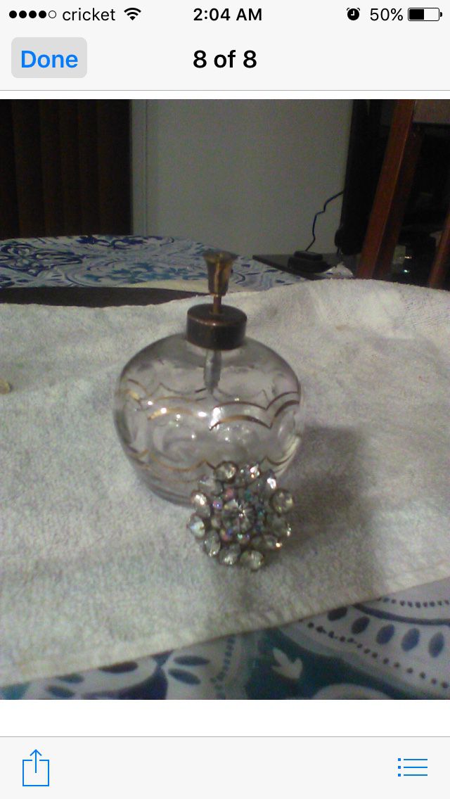 Antique crystal perfume bottle with gold lineing and brass spray cosmetic antique diamond top