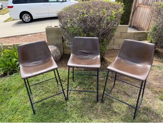 3 counter top height stools.
