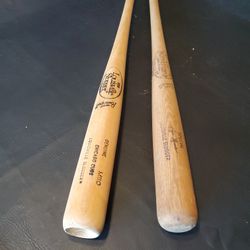 Two Louisville Slugger Baseball Bats