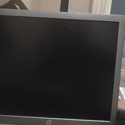 2 HP Computer Monitors With Adjustable Stands