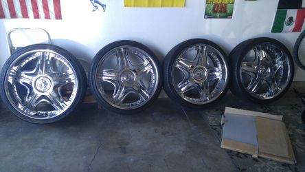 26 inch Chrome rims and tires