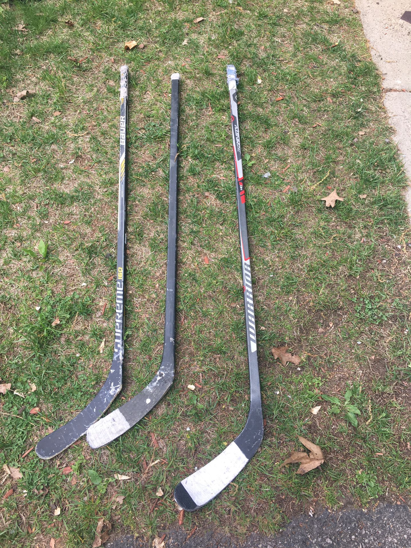 3 hockey sticks