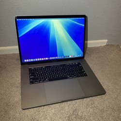 MacBook Pro 15 inch i7 / 16GB, 500gb SSD, Adobe, final Cut, logicpro Ms office   or best offer