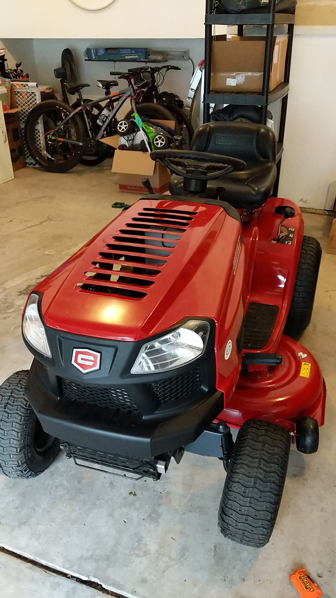 Riding lawnmower Craftsman T1400, comes with dumping trailer. It's new, 35 percent off any store or online.