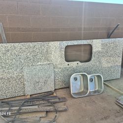 Granite island of 127 x45 with Sink included. 